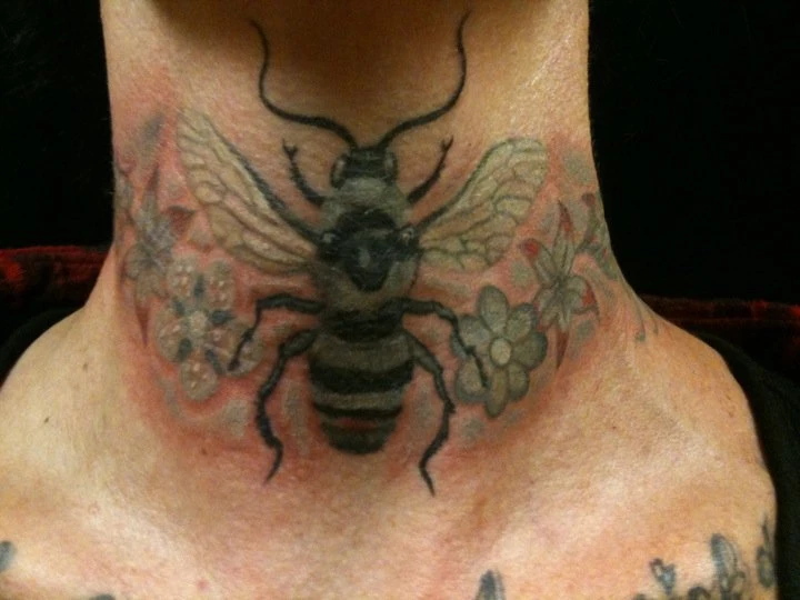 Chrys_Goldberg-Bumblebee_Neck_Tattoo