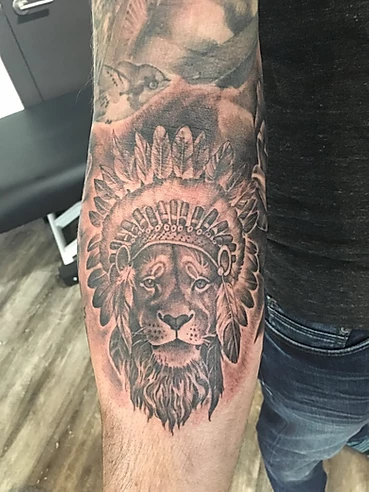 Sarah_Wilson-Lion_Arm_Tattoo