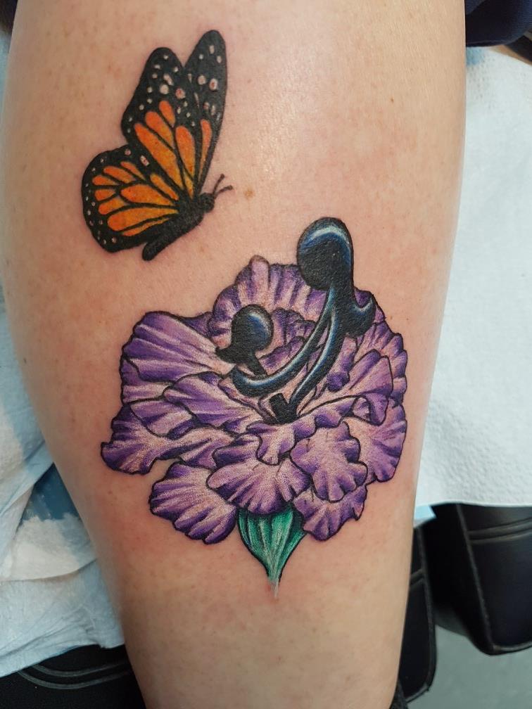 Michele_New_Dimension-Butterfly-Carnation-Tattoo